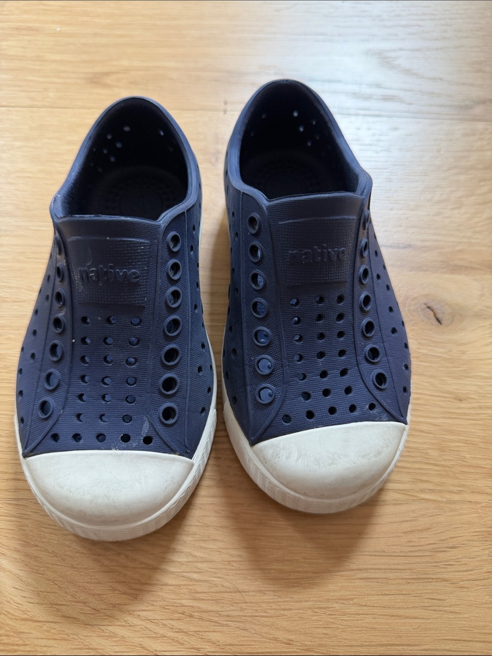 Native Slip-On Sneakers in Navy with White Toe Cap